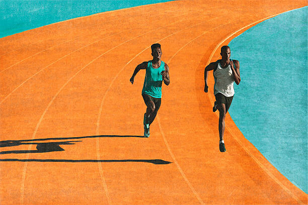 Konstfotografering Male runners sprinting on track