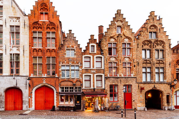 Fotografia Medieval houses standing in a row, Bruges, Belgium