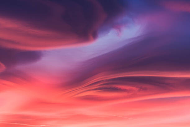 Photographie artistique Moody lenticular clouds at sunset