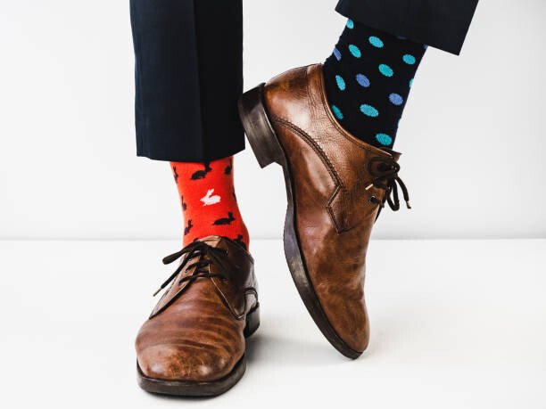 Umělecká fotografie Office Manager in stylish shoes and bright socks