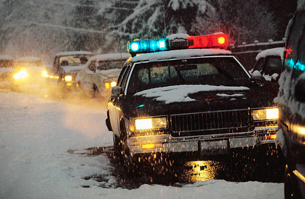 Umělecká fotografie Police Car at Winter Accident Scene