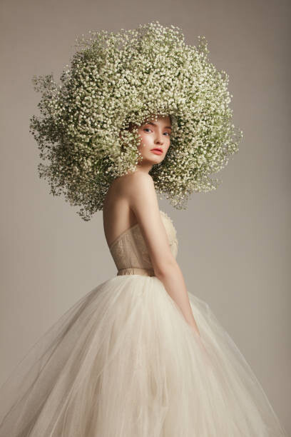 Umělecká fotografie Portrait of beautiful girl with flower wreath