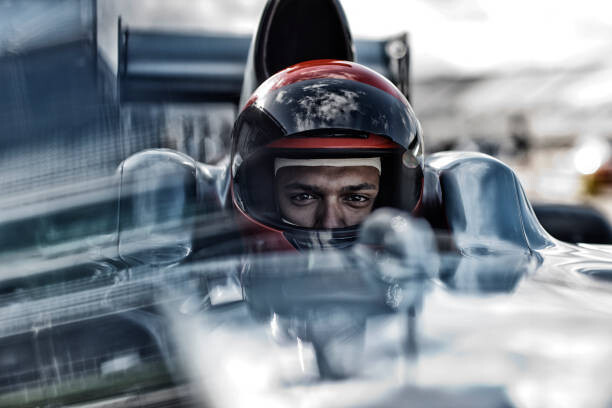 Umjetnička fotografija Racer sitting in car