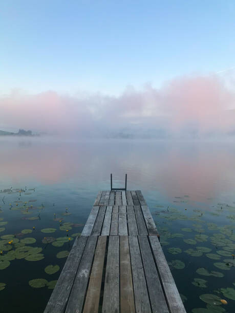 Művészeti fotózás Sunrise at lake Hopfensee with wooden
