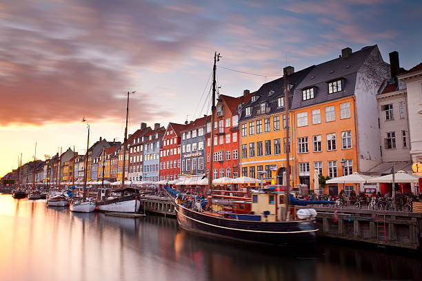 Photographie artistique Sunset on Nyhavn Canal, Copenhagen, Denmark.