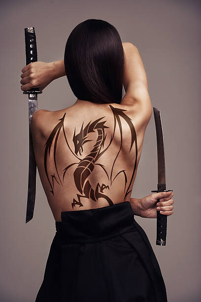 Umělecká fotografie The girl with the dragon tattoo