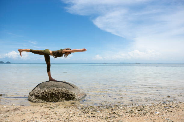 Art Photography Woman doing Warrior 3 yoga pose