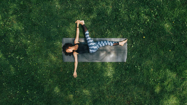 Művészeti fotózás Woman doing Yoga in the Park