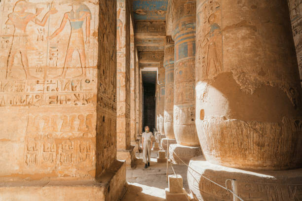Art Photography Woman walking in the ancient Egyptian