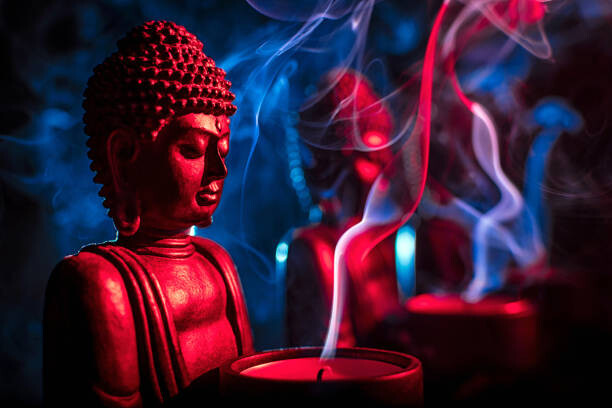 Samolepka Buddha statue with candle