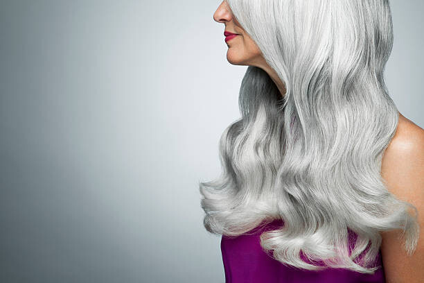 Canvas Print Cropped profile of a woman with long, gray hair.