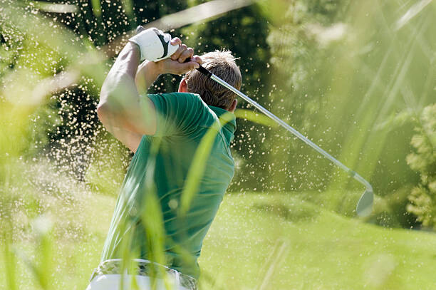 Schilderij op canvas Golf player, rear view