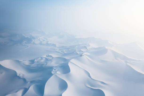 Fototapete Aerial view of Snow covered desert sand dunes