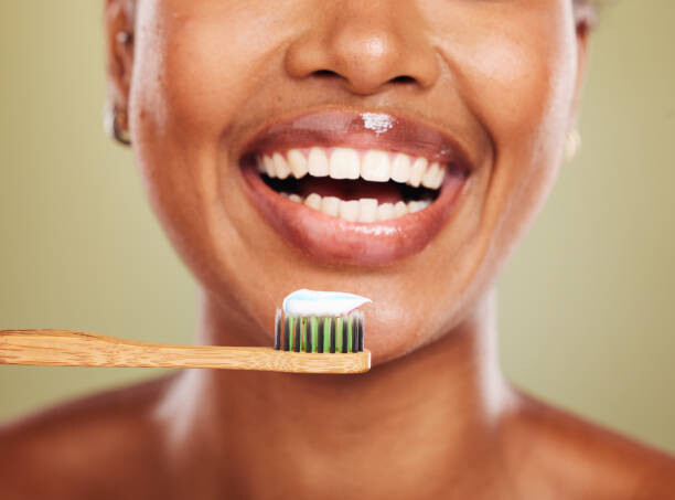 Fototapeta Black woman, wooden toothbrush or teeth