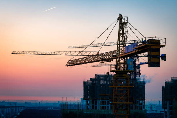Fototapeta Construction site under sunset