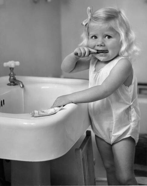 Fototapeta Girl Brushing Teeth
