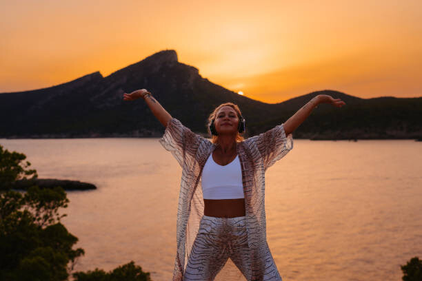 Fototapeta Happy and serene mature woman with