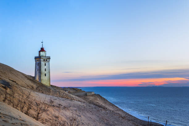Fototapeta Sunset at the lighthouse of Rubjerg Knude