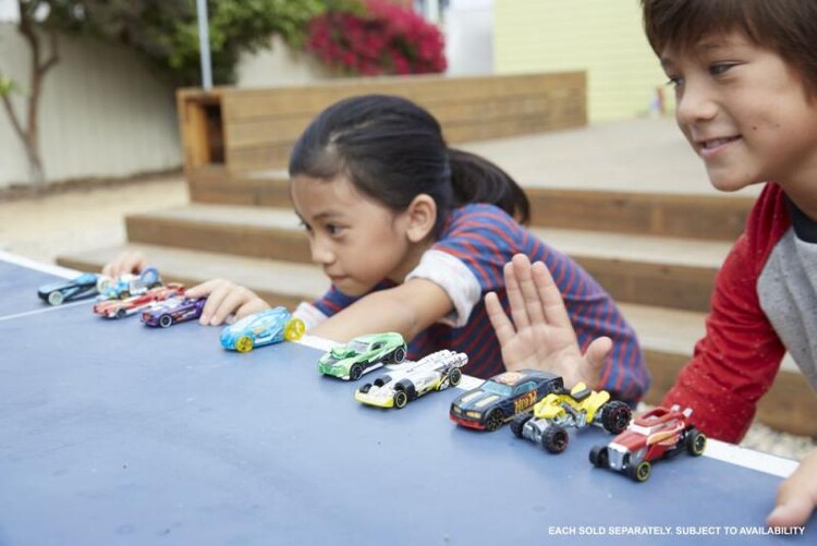 Kids playing with hotsell hot wheels