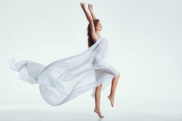 Obraz na plátně Beautiful naked woman with flying scarf