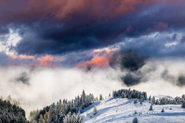 Obraz na plátně Dramatic dawn in winter mountains in the Alps