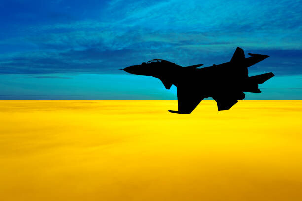 Obraz na plátně Fighter at sunset on the background