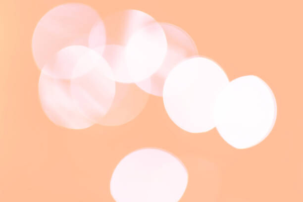 Obraz na plátně Peach fuzz blurred lights defocused bokeh