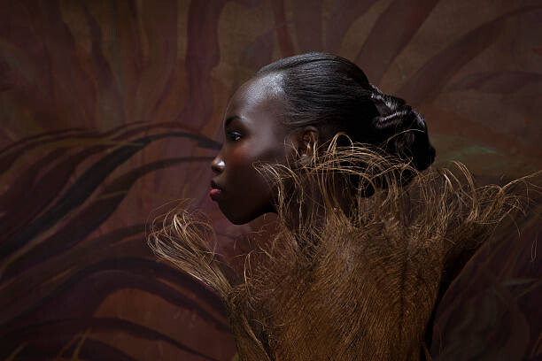 Plakat Beauty Portrait of woman entwined in palm bark