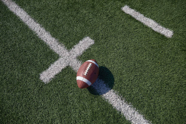 Plakat Overhead view of American football ball on field