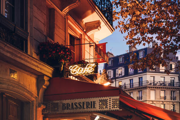 Plakat Parisian cafe at twilight