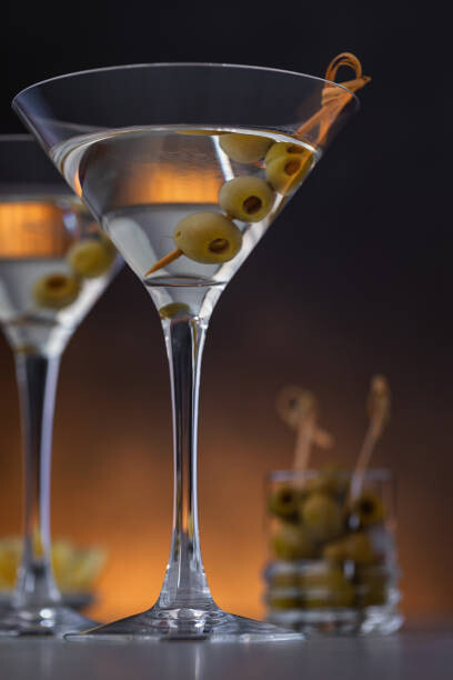 Plakat Two glasses of martini with olives