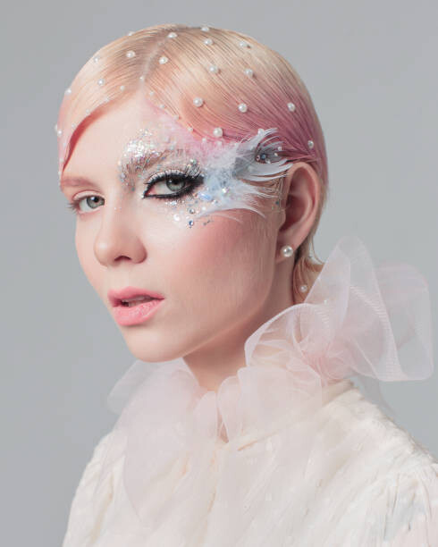 Plakát Blonde girl in white blouse in