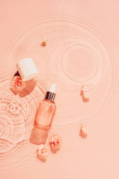 Plakát Pastel peach coloured water background with