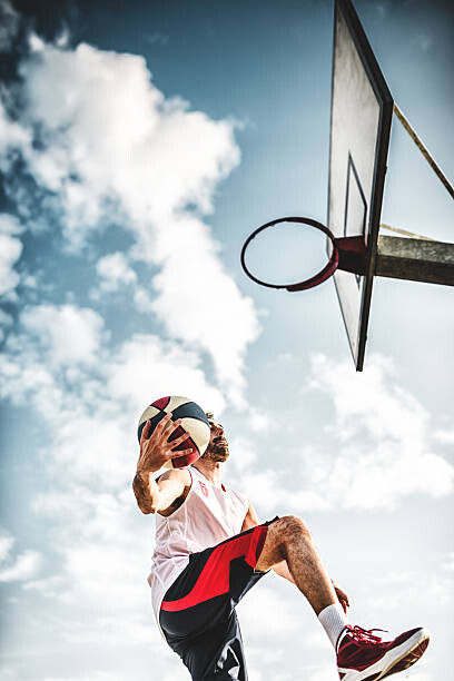 Plakát basketball player jumping to score