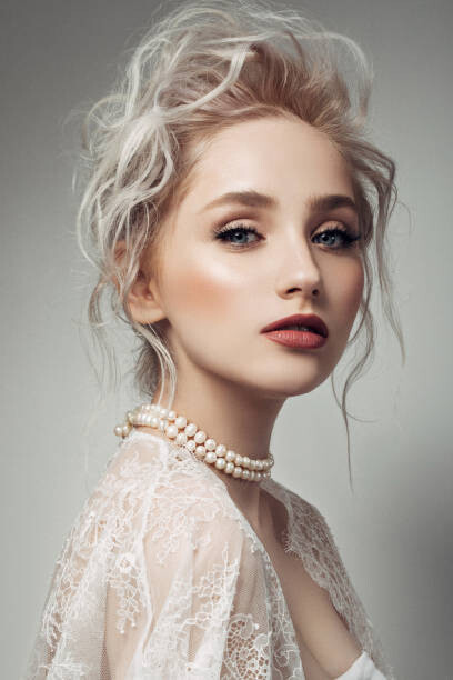 Plakát Beautiful woman with make-up and stylish hairstyle