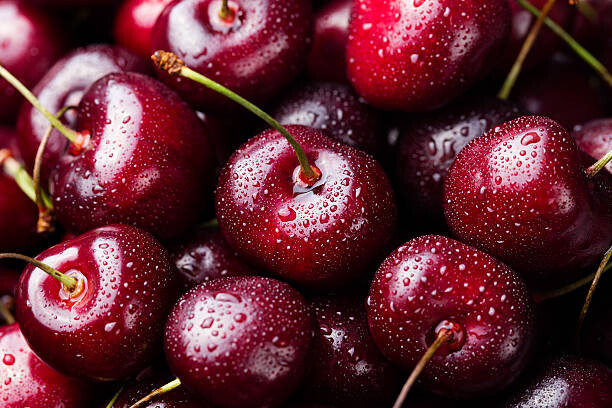 Plakát Fresh ripe black cherries background Top