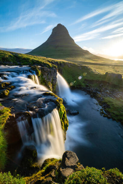Plakát Kirkjufell and waterfall at sunrise in