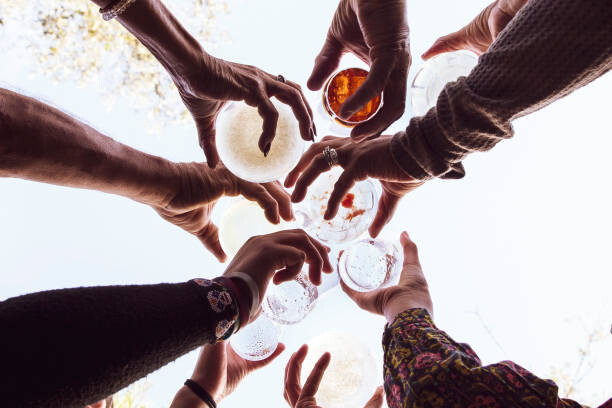 Plakát Low angle view of family toasting