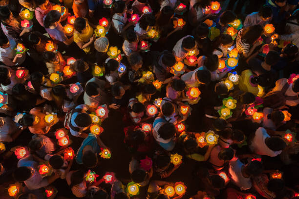 Plakát Participants in a parade celebrate Buddhas