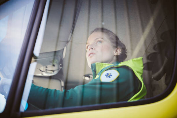 Plakát Thoughtful mid adult paramedic sitting in