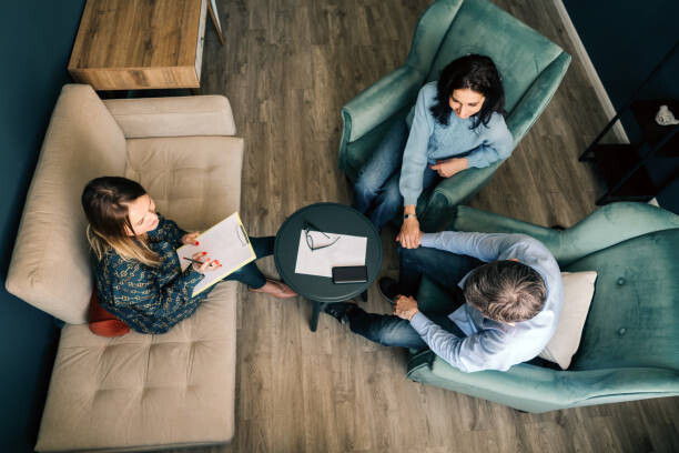 Plakát Three persons talking in the office