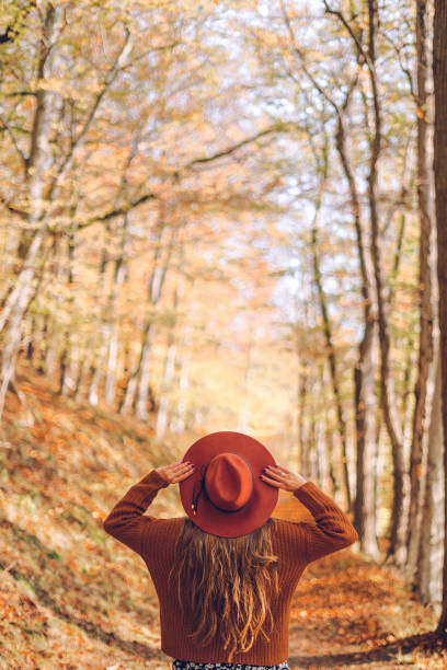 Plakát Woman in the autumn forest