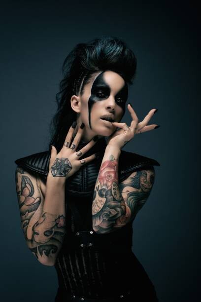 Plakát Young woman cyberpunk, tattooed, finger in