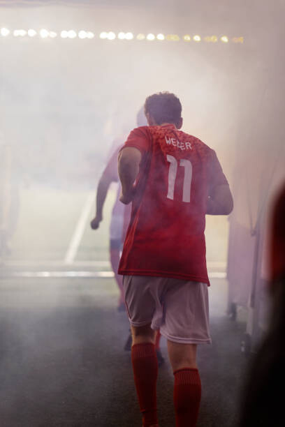 Obraz na płótnie A professional male soccer player jogs