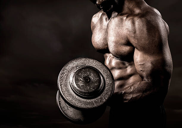 Obraz na płótnie Bodybuilder performing power lift curl