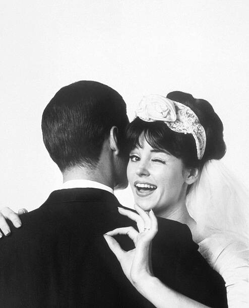 Obraz na płótnie BRIDE HUGGING HUSBAND, OKAY GESTURE, 1963