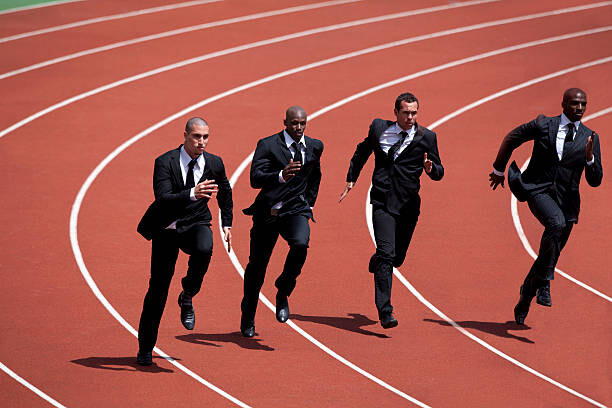 Obraz na płótnie Businessmen runnin g on track