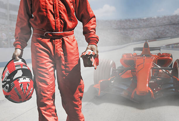 Obraz na płótnie Driver walking away from open-wheel single-seater