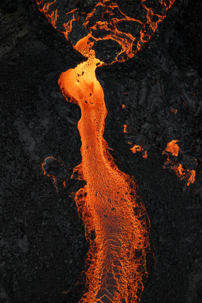Obraz na płótnie Drone image looking down on a lava river, Iceland