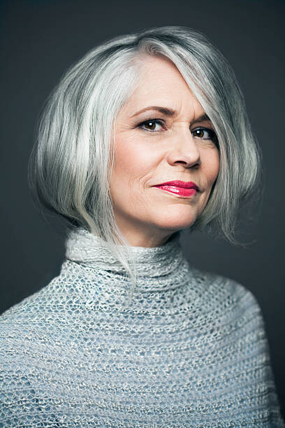 Obraz na płótnie Grey haired lady with red lipstick, portrait.